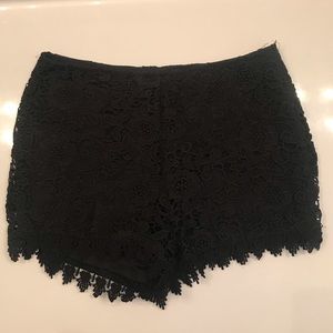 BLUE RAIN black floral shorts